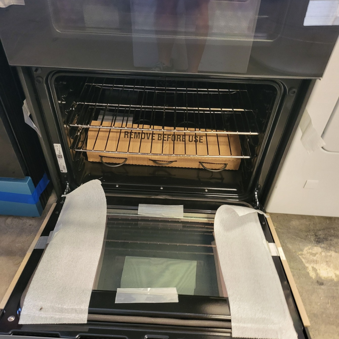 GE 30 Inch Electric Double Oven Range with 5 Radiant Elements, 6.6 Cu. Ft. Total Capacity, Ceramic Glass Smoothtop, Steam Clean, Power Boil Element, Warming Zone, Convection Oven, 8-Pass Bake Element, Fast Preheat, and Sabbath Mode: Stainless Steel