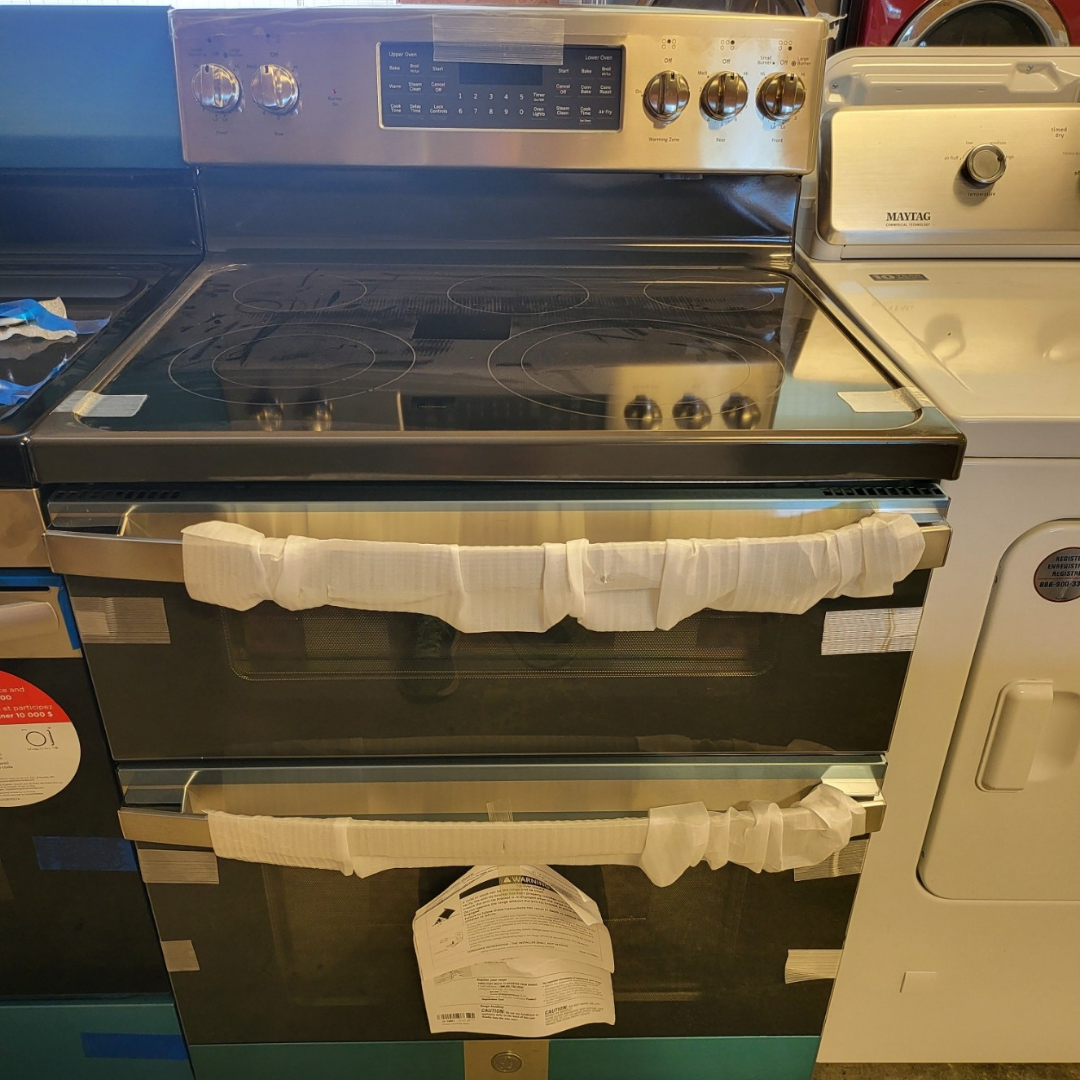 GE 30 Inch Electric Double Oven Range with 5 Radiant Elements, 6.6 Cu. Ft. Total Capacity, Ceramic Glass Smoothtop, Steam Clean, Power Boil Element, Warming Zone, Convection Oven, 8-Pass Bake Element, Fast Preheat, and Sabbath Mode: Stainless Steel