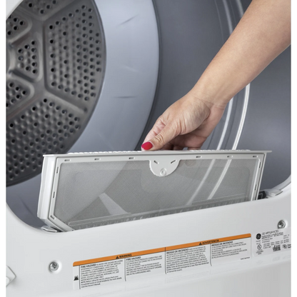 Person removing a dryer filter from a dryer