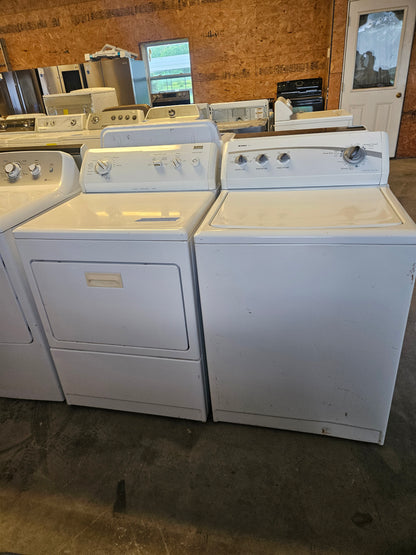 A set of white Kenmore elite direct drive washer and dryer appliances, displayed with the washer on the left and the dryer on the right.